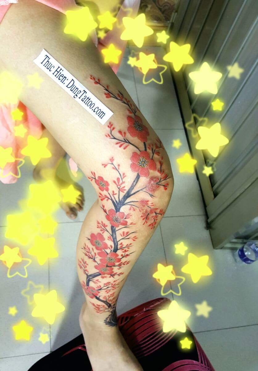 Hình xăm hoa đào lấp sẹo chân -thực hiện tại dũng 0907775670