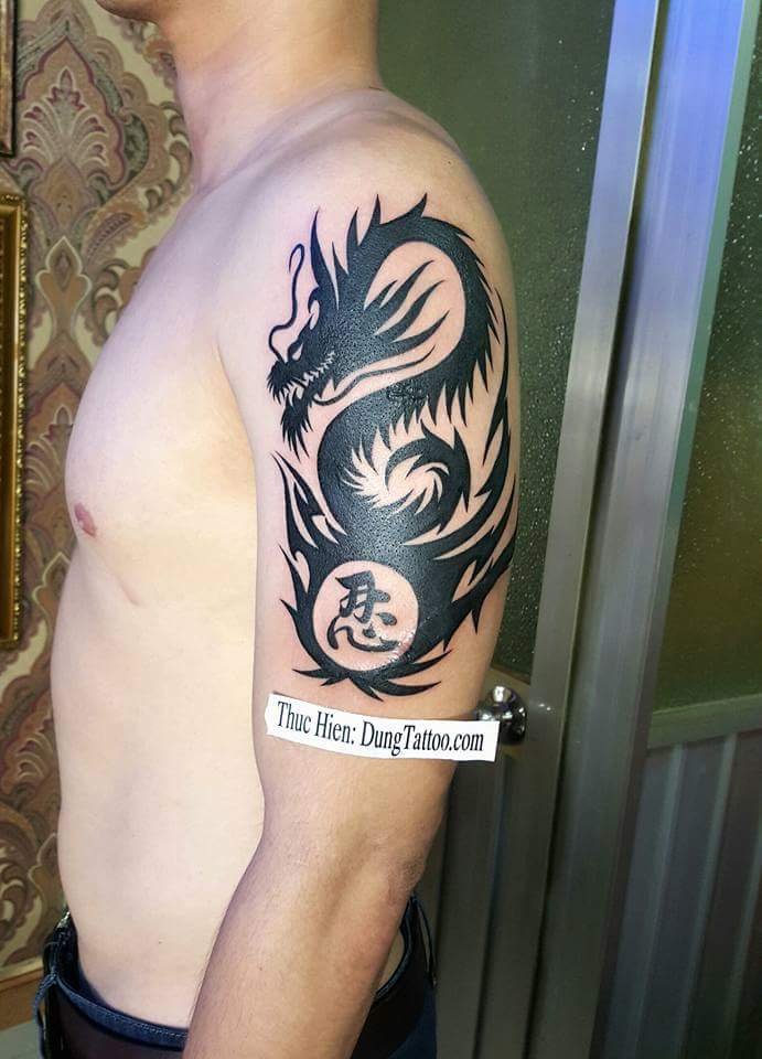 Hình xăm rồng hoa văn cánh tay dragon tribal -thực hiện tại dũng 0907775670