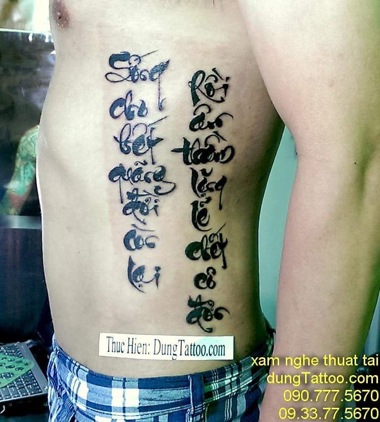 Hình xăm chữ bên hông bụng nam tính -thực hiện tại dũng 0907775670