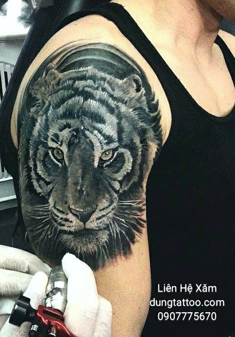 hinh xam dau cop canh tay dungtattoo thuc hien
